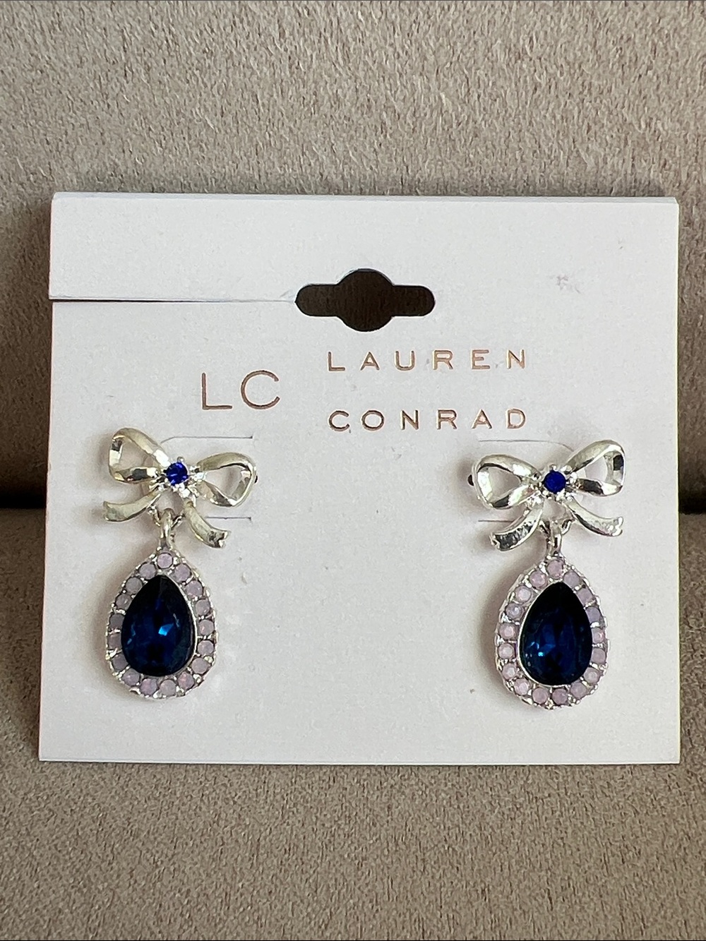 NWT LC Lauren Conrad Silver Bow Drop Earrings with Blue Teardrop Stones
